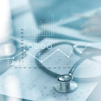 graphic overlay of business charts over photo of stethoscope